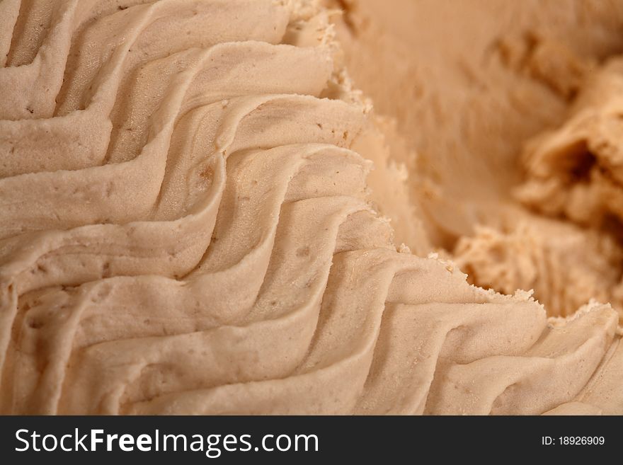 Ice-cream texture: chocolate with peanut and cream-brjule, vanilla. Appetizing ice-cream background