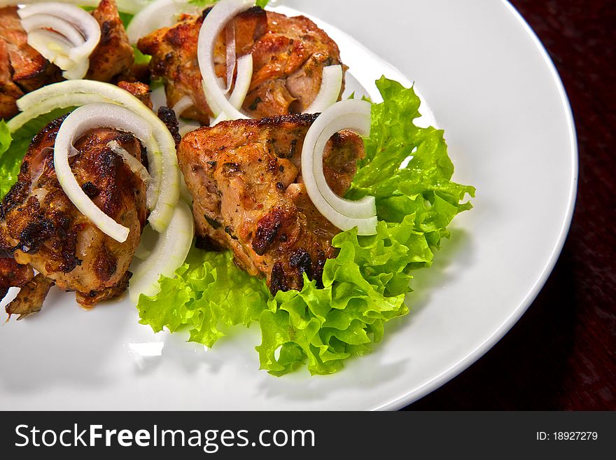 Appetizing stake with vegetables. Shish kebab