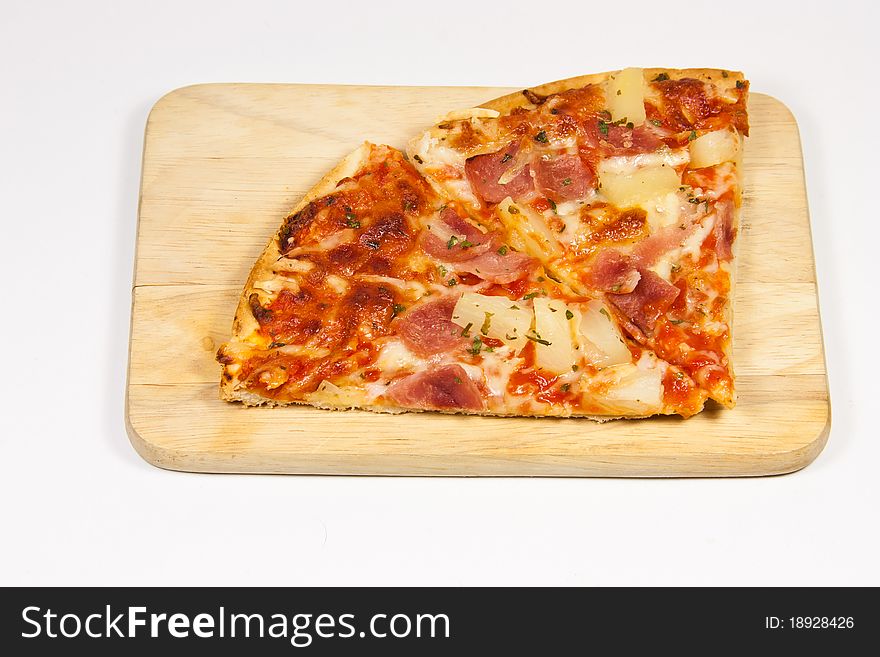 Picture of two pizza slices on a wooden board