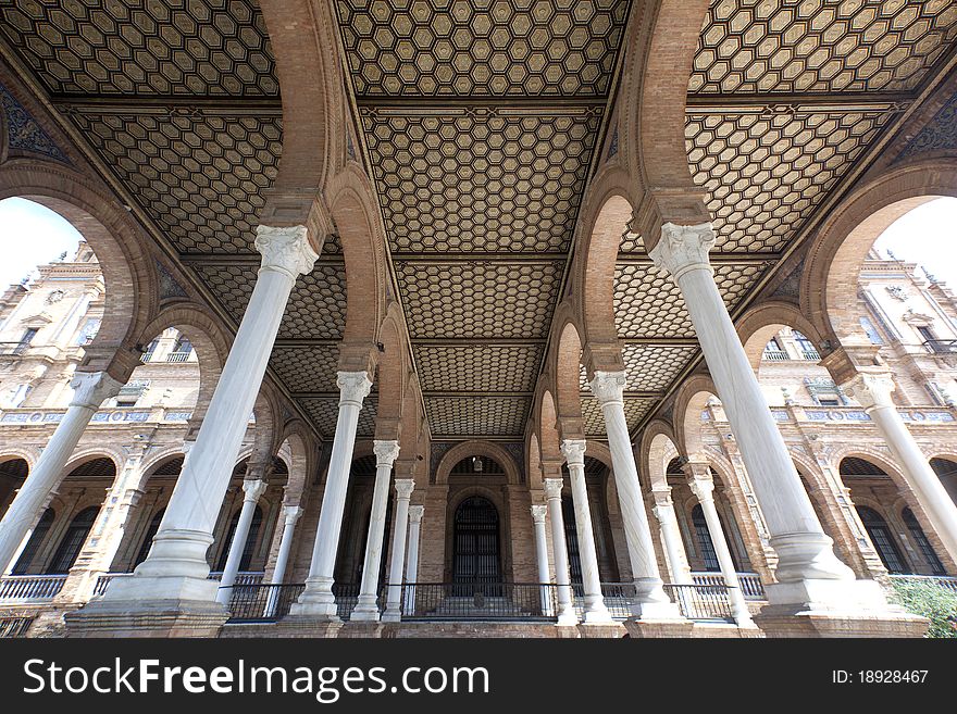 Columns and arcades in spanish palace entrance