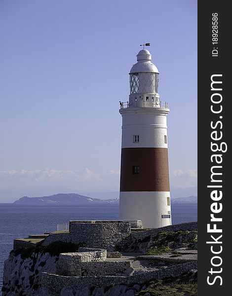 Lighthouse in a side of sthe strait of Gibraltar. Lighthouse in a side of sthe strait of Gibraltar