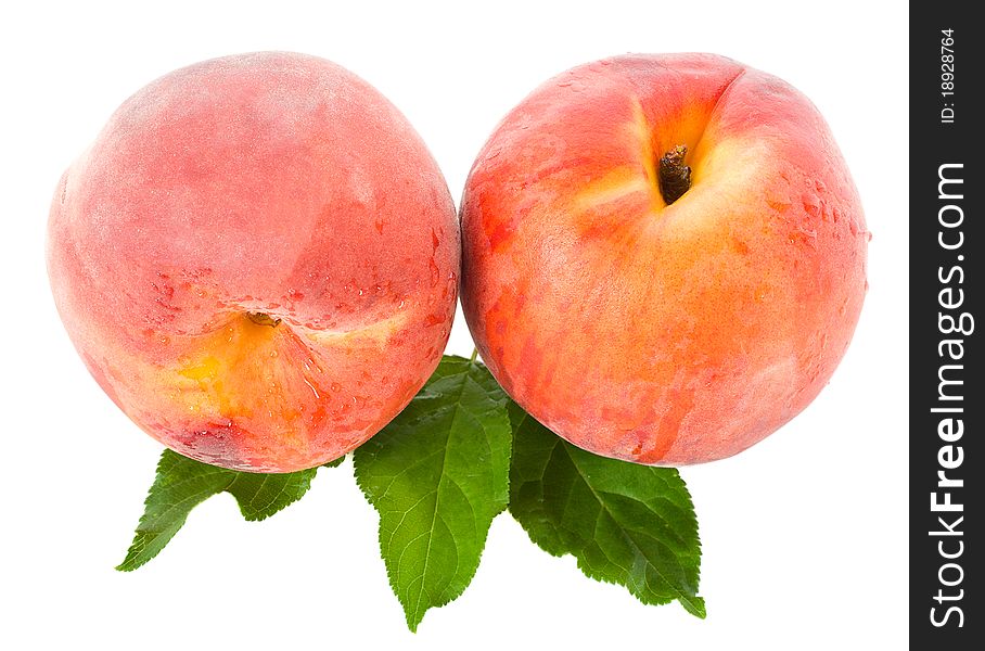 Close-up ripe peaches, isolated on white