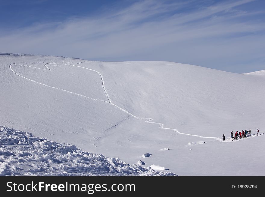 Heart shaped trails in a snow slope