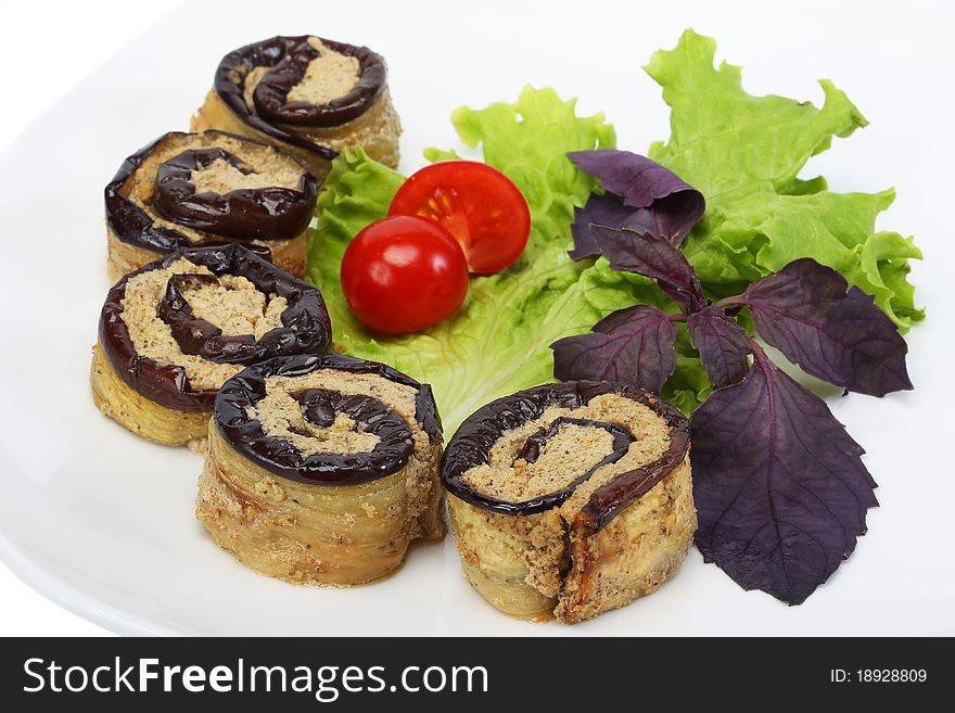 Eggplant stuffed with nuts with greens