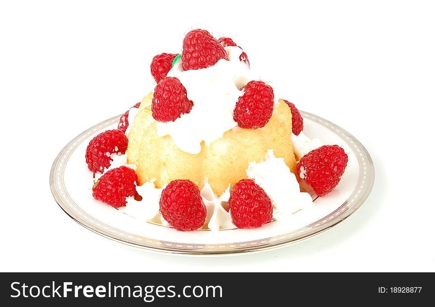 Raspberry dessert with light cream on the white. Raspberry dessert with light cream on the white.