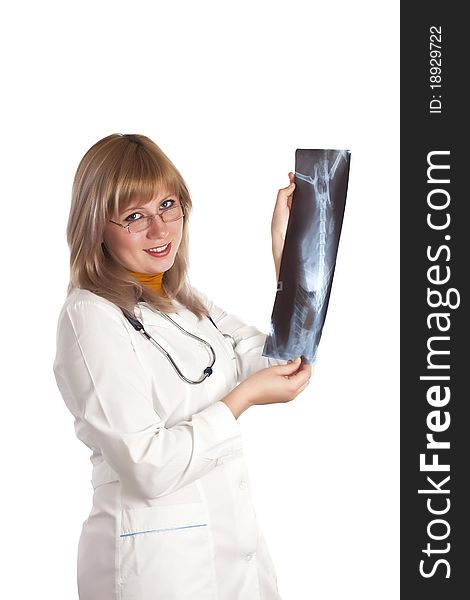 Smiling medical doctor woman with stethoscope and X-ray picture. Isolated on the white background