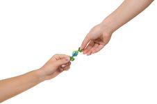 Two Hands With Candy Royalty Free Stock Photography