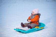 Adorable Baby Sliding On Sleigh From Hill Royalty Free Stock Images Adorable Baby Sliding On Sleigh From Hill Royalty Free Stock Images