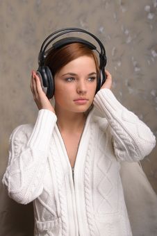 Young Woman Listening To Headphones Stock Images