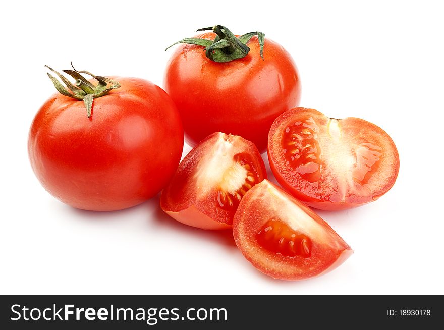Red fresh ripened tomatoes isolated on a white background