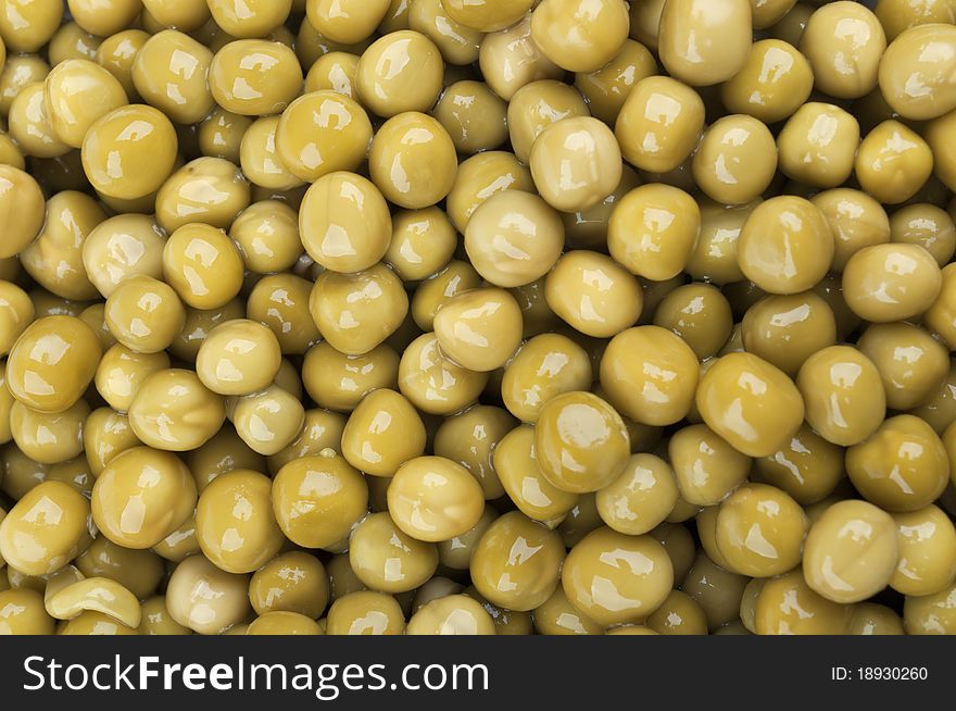 Many green and fresh peas on the background. Many green and fresh peas on the background