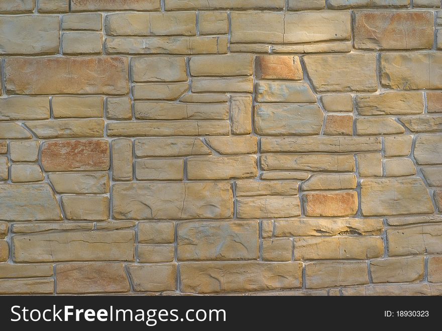 Horisontal stone wall with sunlight