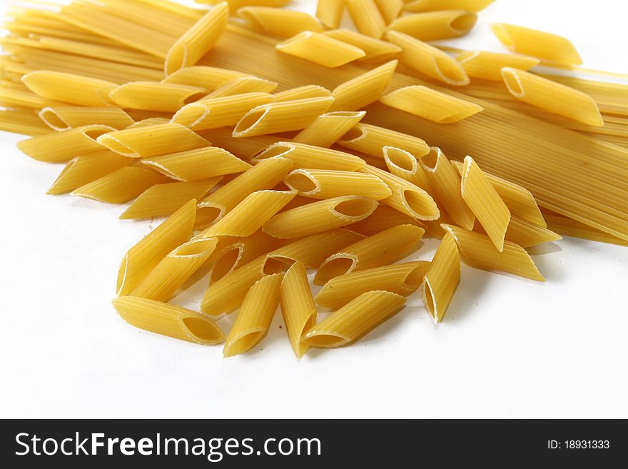 Two types of italian pasta on white background