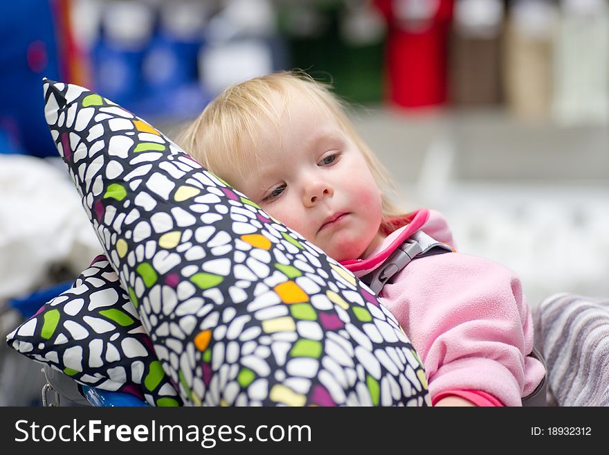 Adorable baby sit on shopping cart