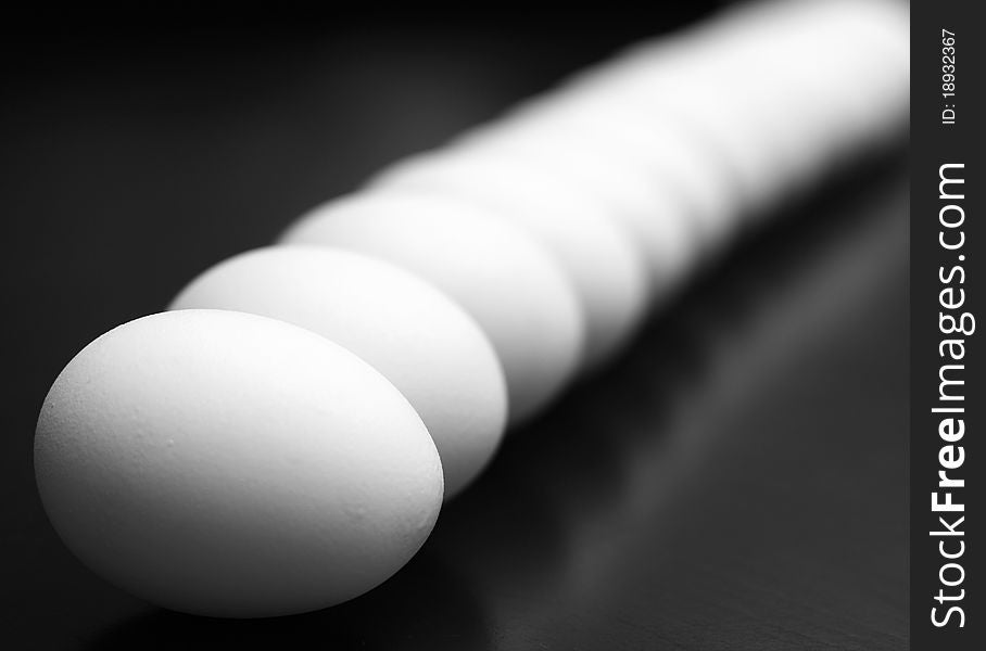 Bokeh displayed by a row of eggs. Bokeh displayed by a row of eggs