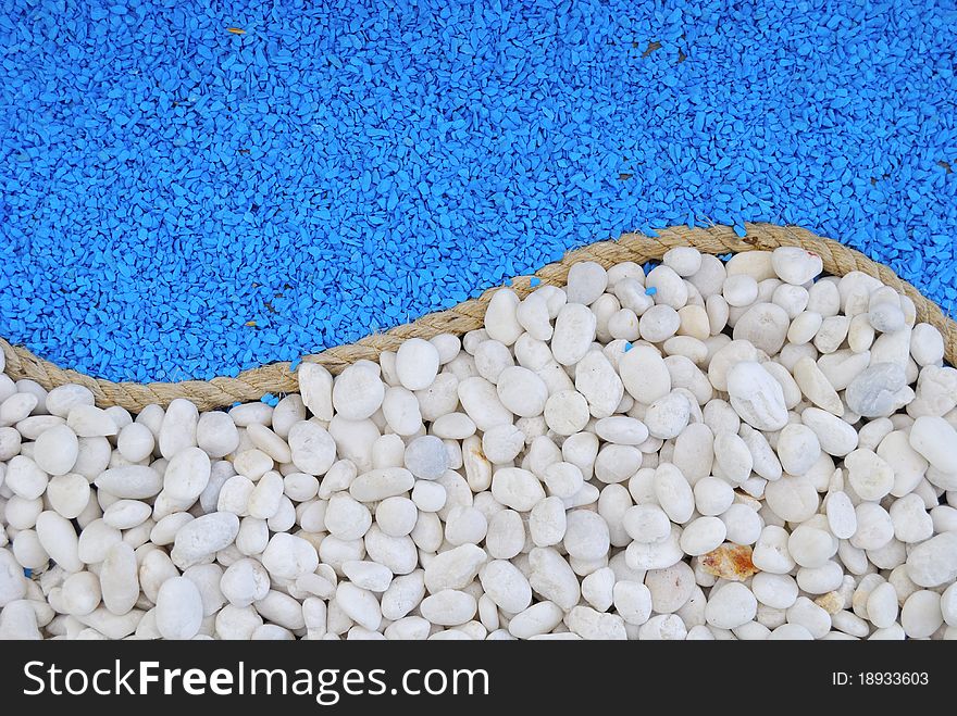 Rope between white and blue stones for background