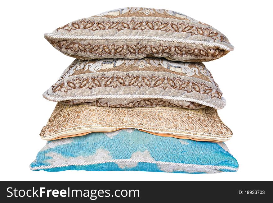 Stack of pillow isolated on white. Clipping path included. Stack of pillow isolated on white. Clipping path included.