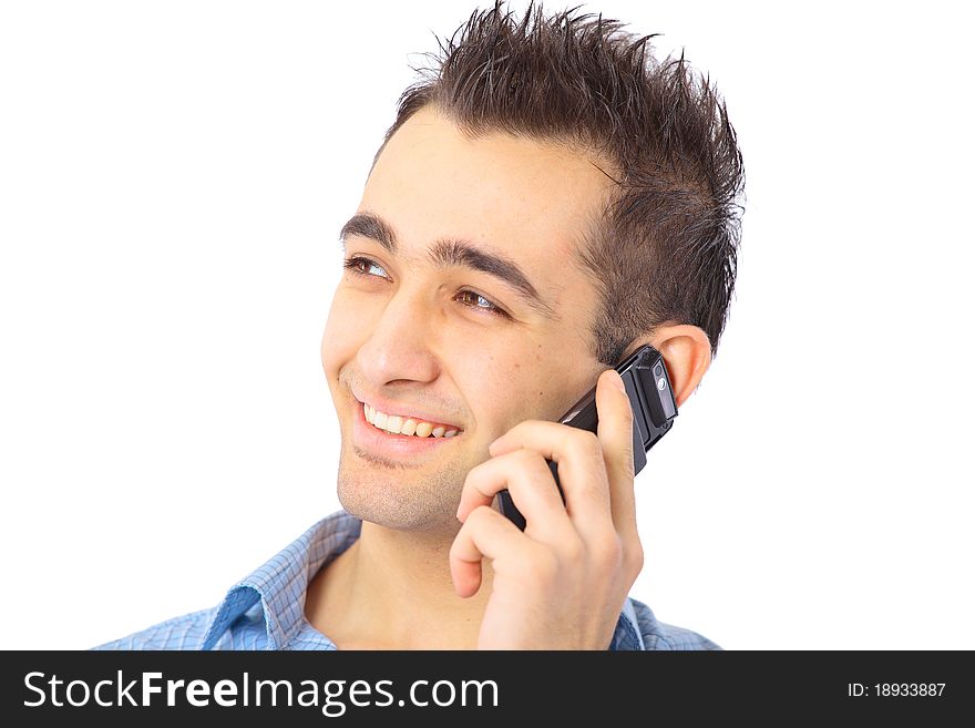 Closeup portrait of a happy young businessman talking on mobile phone