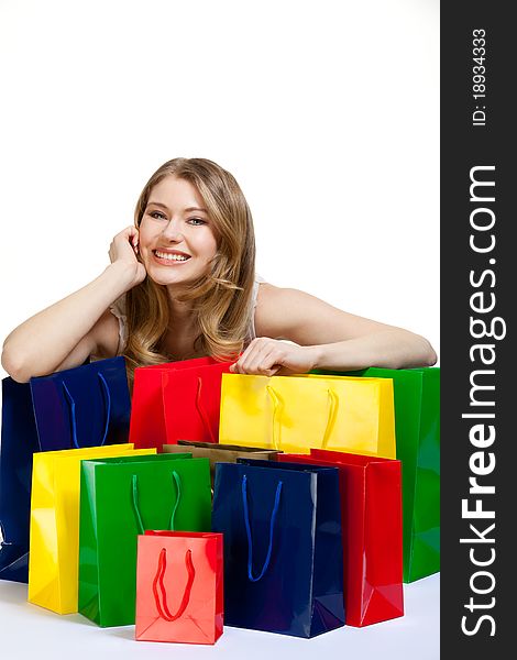 Young woman with a lot of shopping bags. Young woman with a lot of shopping bags