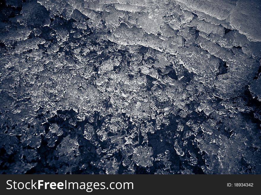 Beautiful ice crystals background tint in blue