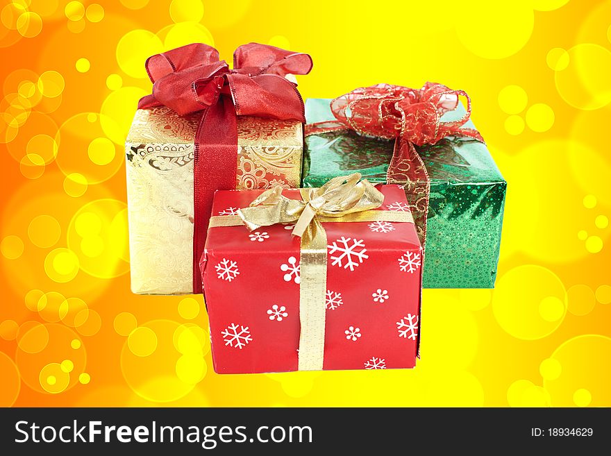 Boxes with gifts. Beautiful background from yellow circles