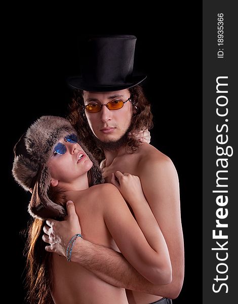 young couple. Posing in a studio. young couple. Posing in a studio