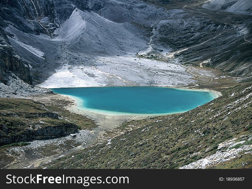 Glaciers melted, dripped water formed a shallow pond at 4500m altittude. Glaciers melted, dripped water formed a shallow pond at 4500m altittude