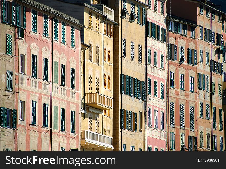 Colored buildings with windows in Camogli. Colored buildings with windows in Camogli