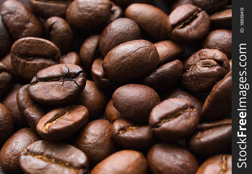 Assorted roasted coffee beans background
