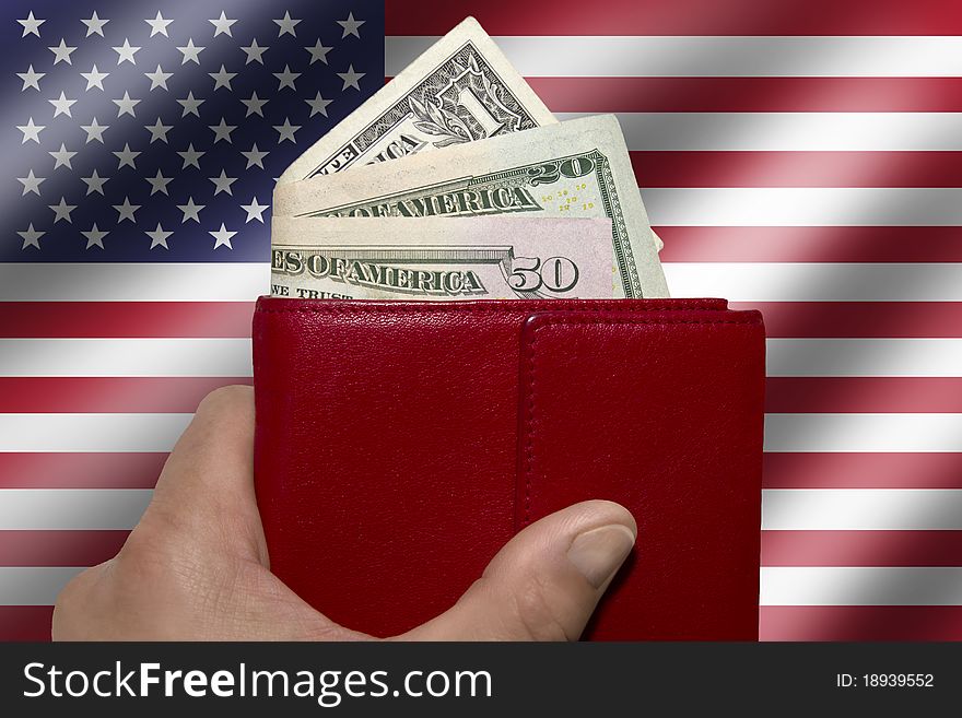 Male hand holding red wallet with US dollar bills. Male hand holding red wallet with US dollar bills