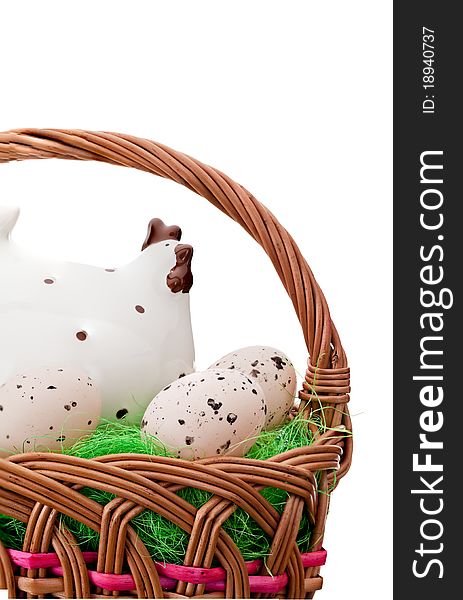 Woven basket full of eggs. Isolated on a white background. Woven basket full of eggs. Isolated on a white background.