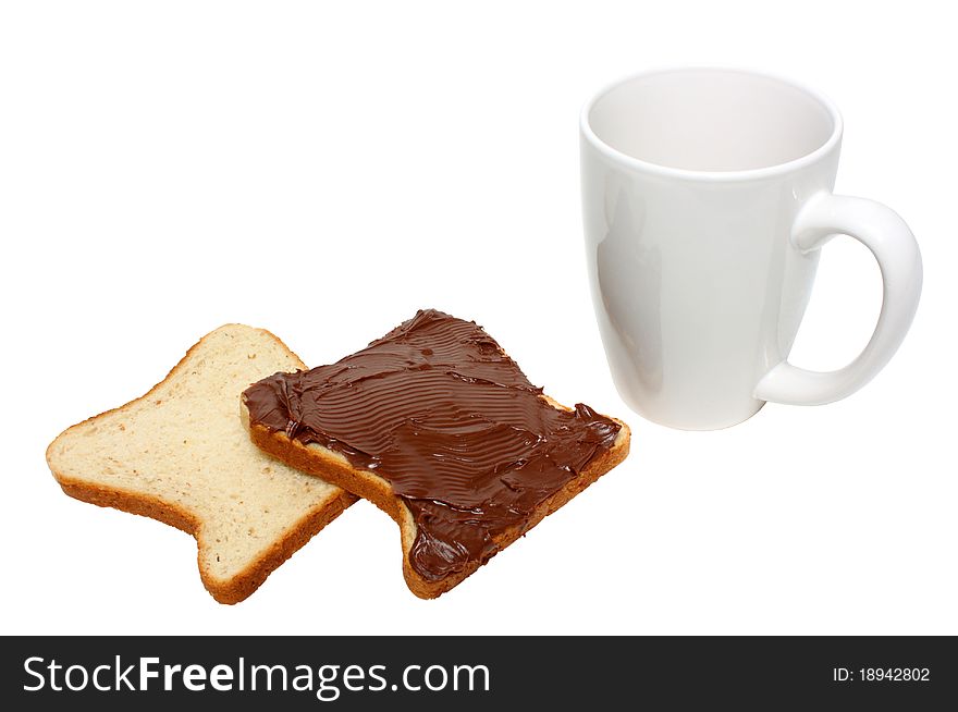 Slice of bread with chocolate cream and coffee mug isolated on a white background