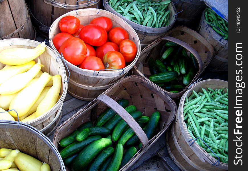 Harvest of yellow squash, tomatoes, cucumbers and green beans. Harvest of yellow squash, tomatoes, cucumbers and green beans