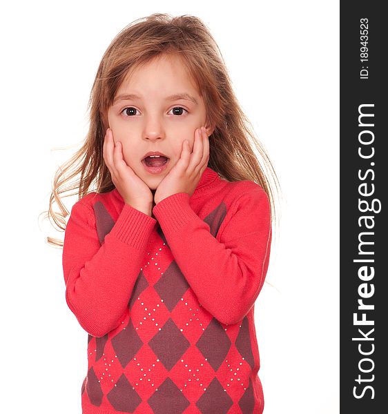 Portrait of a pretty little girl in sweater on white background