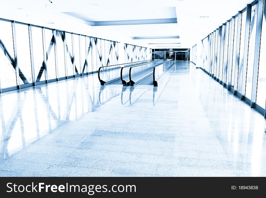 Blue Glass Corridor In Office Centre