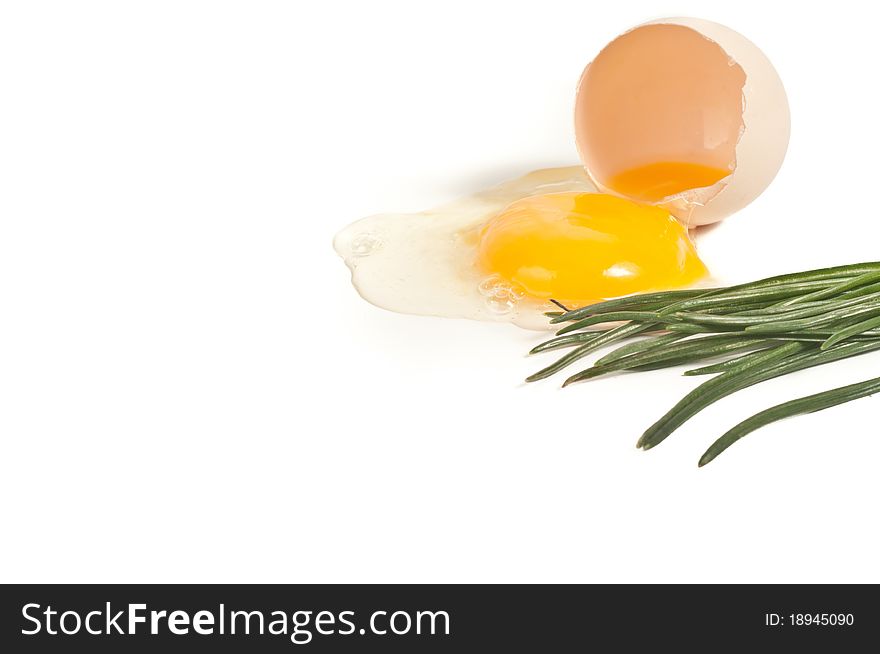 Cracked egg closeup on isolated white background