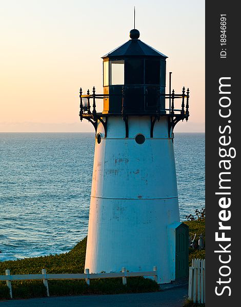 Point Montara Lighthouse on a clear day at sunset.