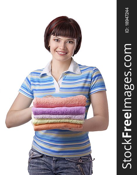 Woman holding clean towels