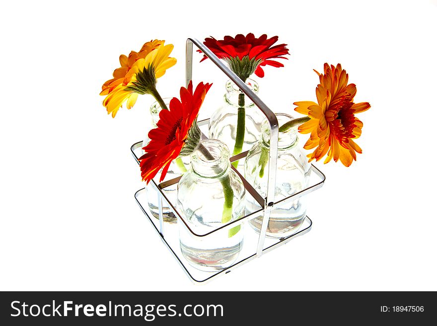 Tray with vases of glass with springflowers. Tray with vases of glass with springflowers