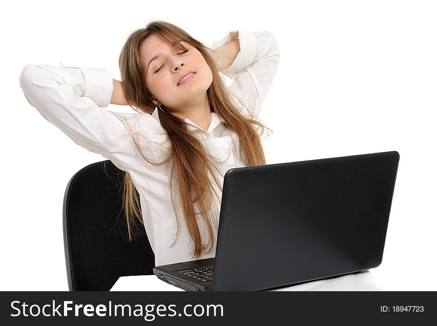 Woman with a laptop rest - isolated over a white background