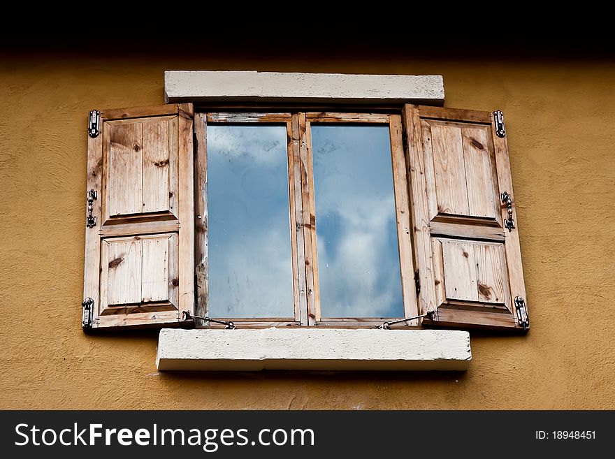 Wooden window reflect gray cloud. Wooden window reflect gray cloud