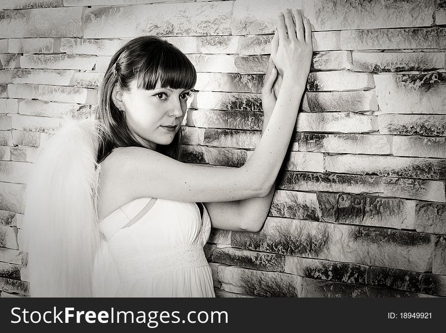 Angel Girl On Brick Wall Background