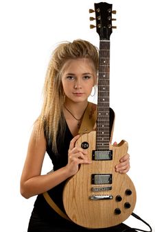 Rock Girl Playing An Electric Guitar Royalty Free Stock Photos