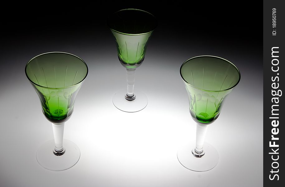Three glasses of green glass. Three glasses of green glass