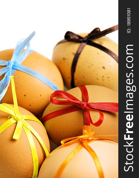 Easter eggs with different ribbons and bows, isolated on white. Easter eggs with different ribbons and bows, isolated on white