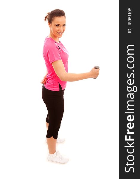 A girl performing an exercise with a weight on a white background. A girl performing an exercise with a weight on a white background