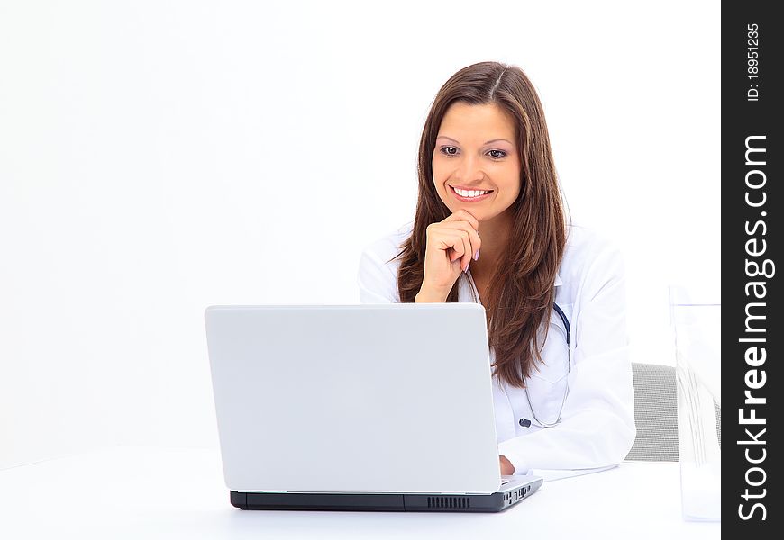 Businesswoman working at desk, isolated on white. Businesswoman working at desk, isolated on white.