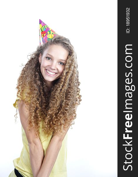 Smiling Woman In Birthday Hat Over White