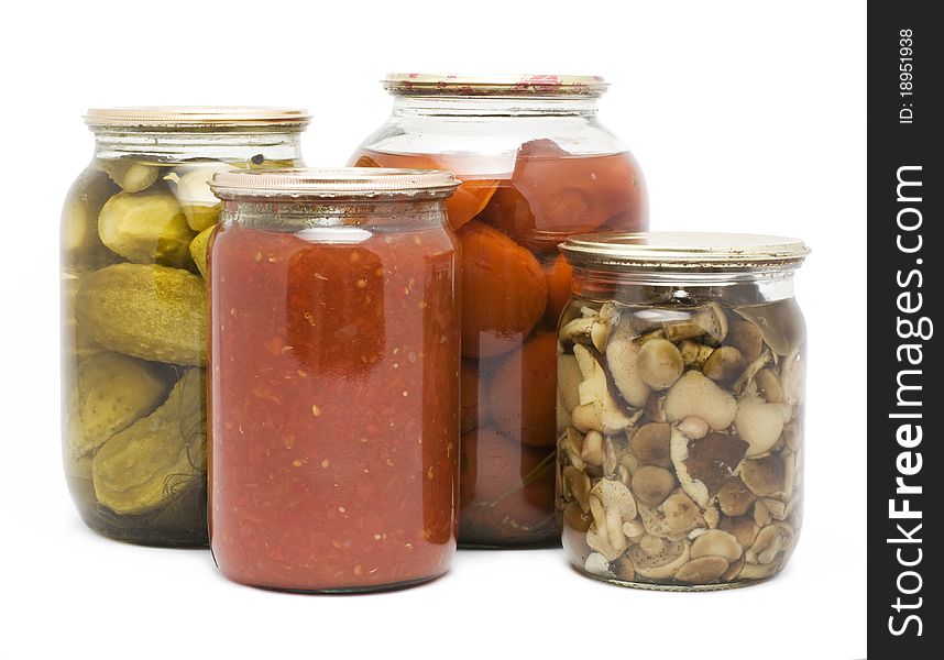 Picture of preservations in jars on a white background