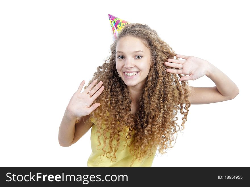 Young happy woman in birthday hat over white. Young happy woman in birthday hat over white